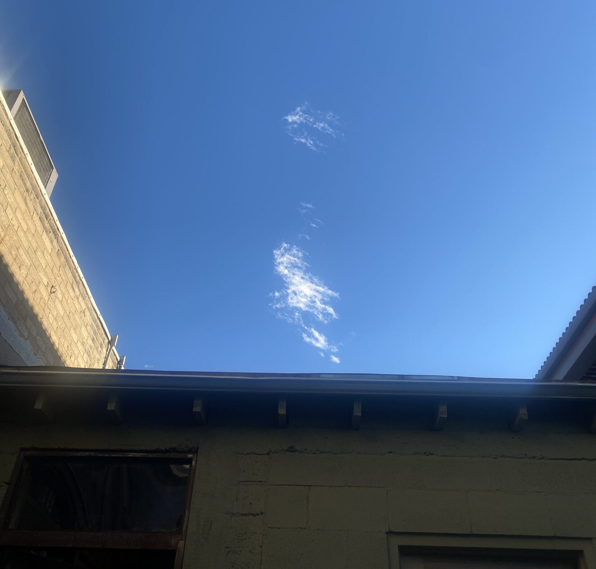 sky above an outdoor cafe in Albuquerque, from a good memory day that now hurts