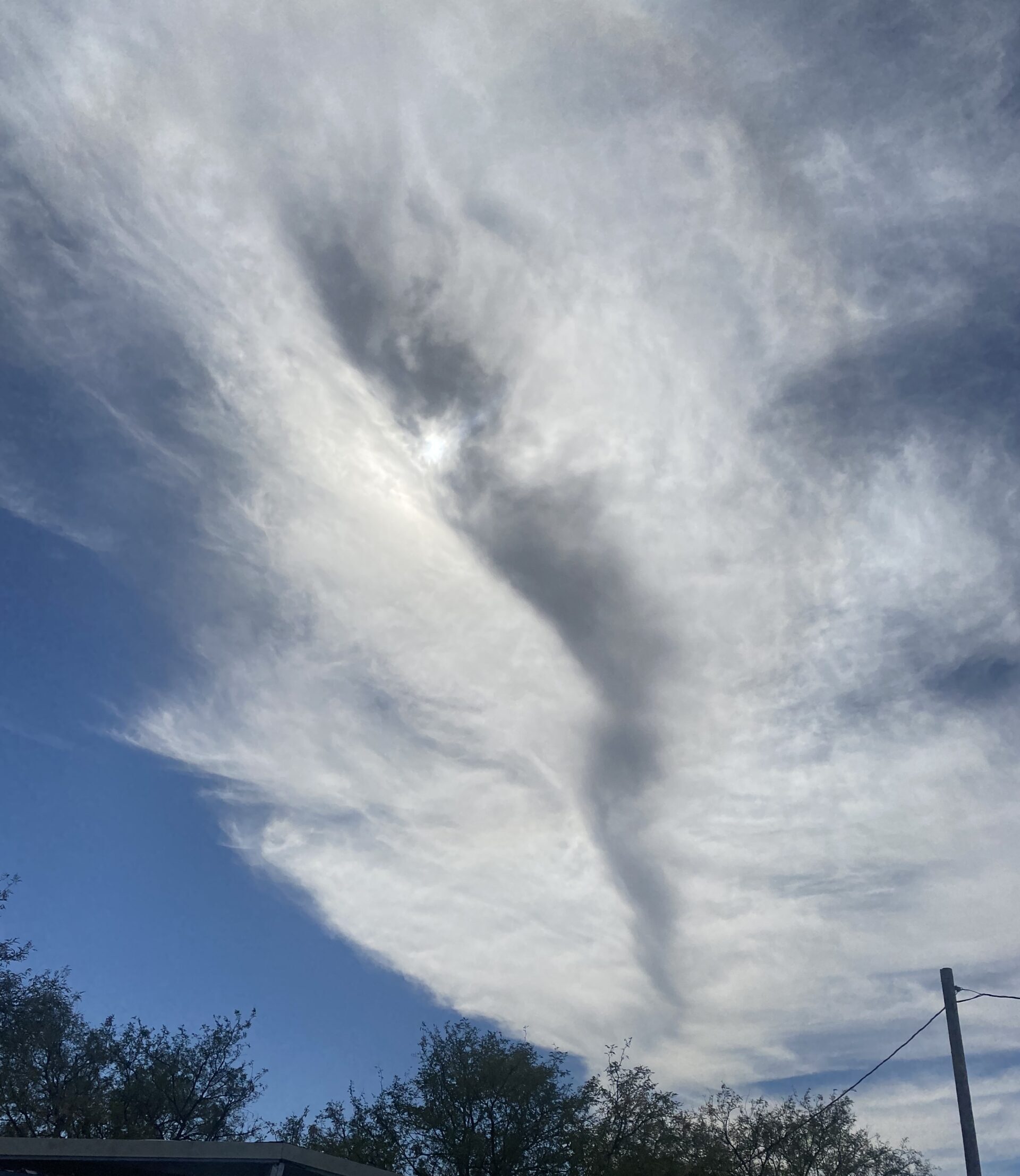 wild funnel clouds taking up the whole sky