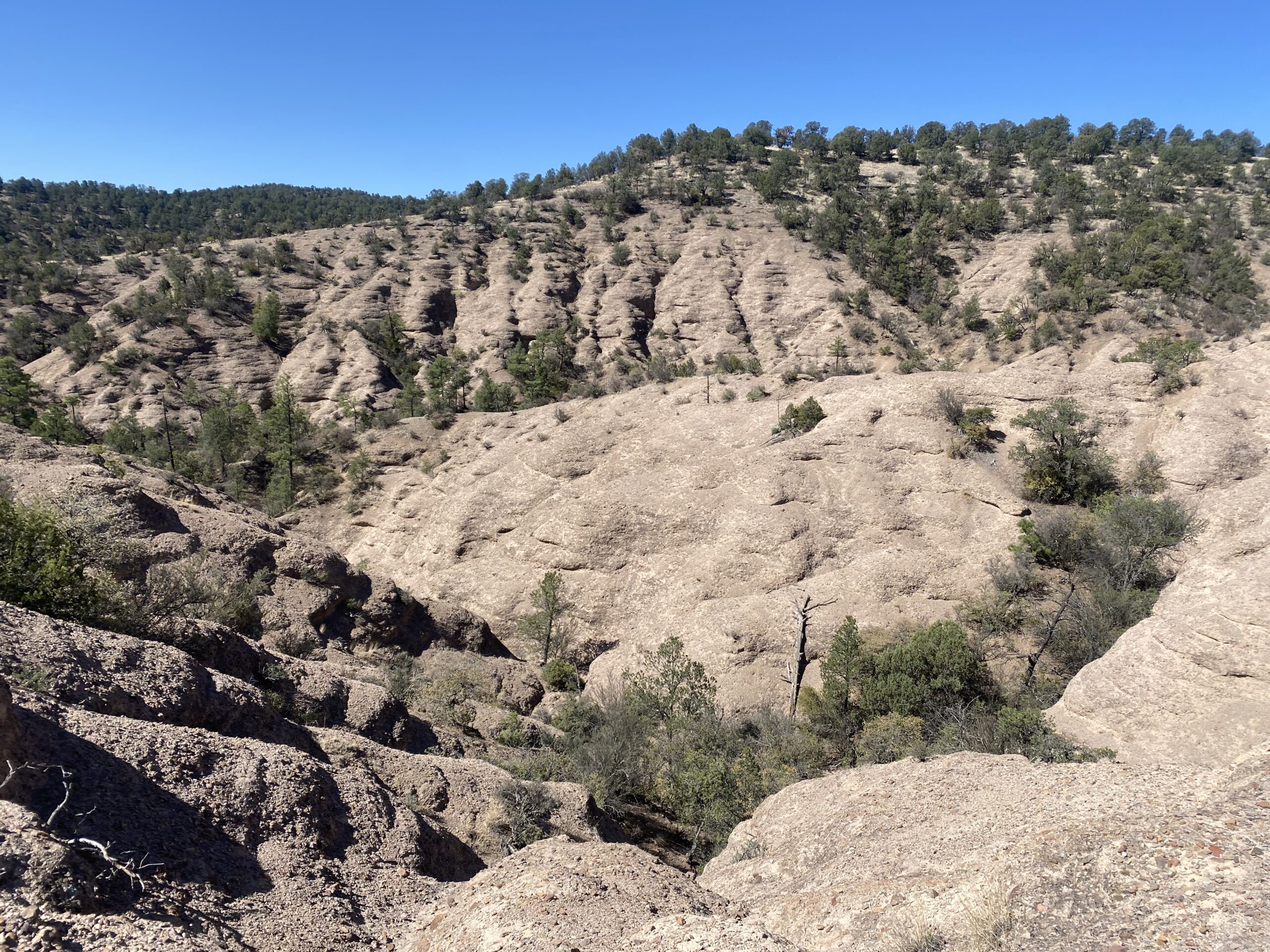 barren desert landscape, blue sky, before the fires