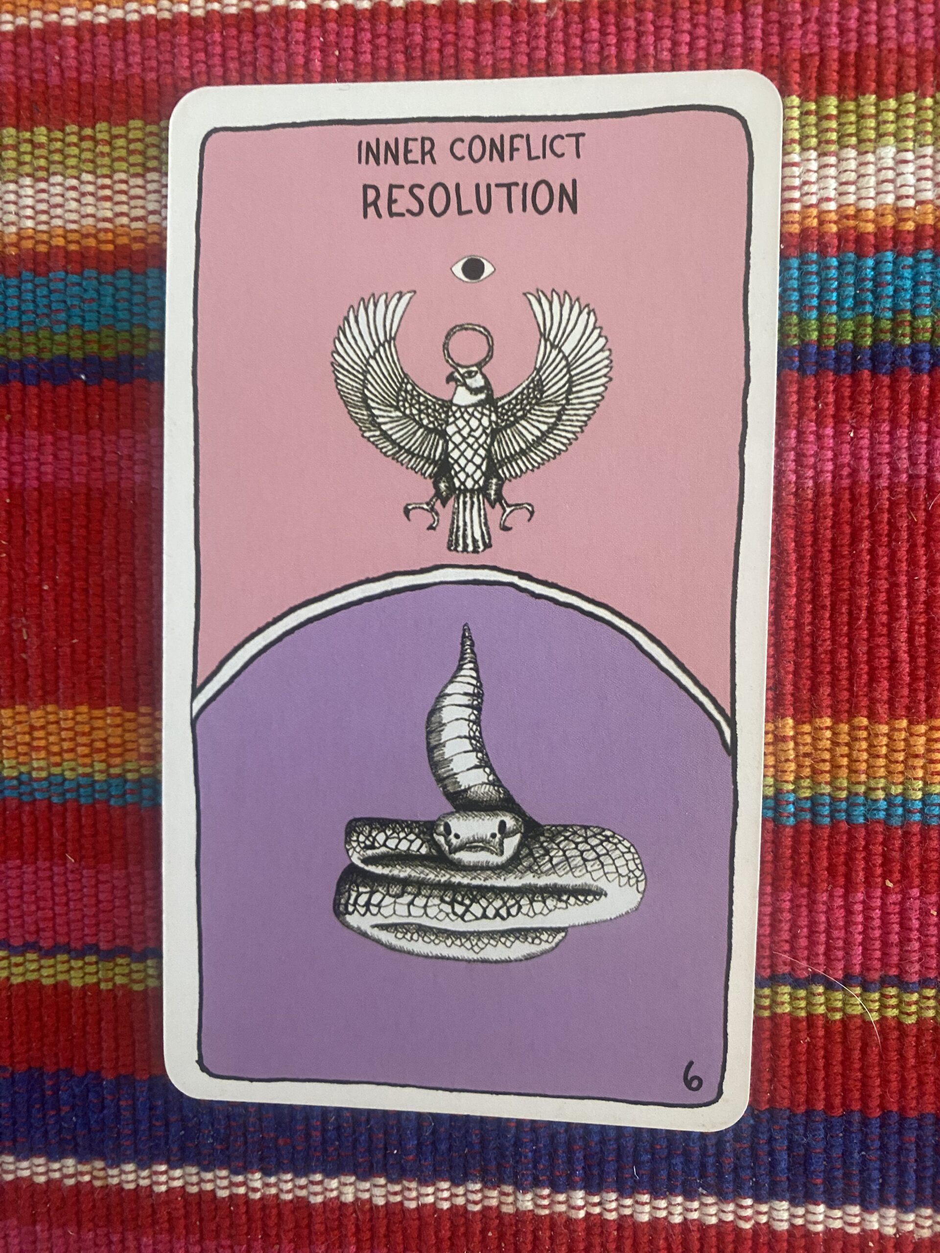 a pink and purple tarot-style card says Internal Conflict Resolution, and features an eagle and a snake”/></p>
<div class=